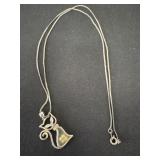 sterling silver cat pendant necklace featuring a