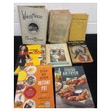 Group of cook books.  Some are antique and vintage