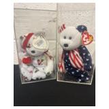 2 ty beanie babies in display cases