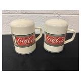 Vintage Coca Cola shakers.