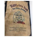 burlap bag advertises a fictional product called