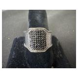 Size 11.5 menï¿½s ring with a rectangular face and
