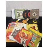 Group of vintage kids 45s records.
