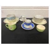 Group of vintage cups and saucers.