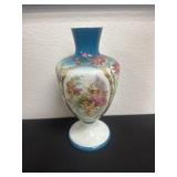 11ï¿½ vintage porcelain vase featuring a blue top