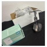 Hanging tie clips and shower filter