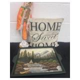 Home sweet home pillows, tray and statue.