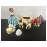 Group of figurines all chipped