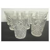 Glass cups with one has a crack and some have