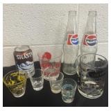 Glass bottles and shot glasses