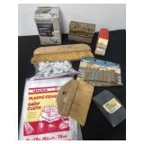 Sanding blocks and plastic cover and brooms
