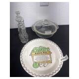 Chipped Apple pie and and dish with oil dispenser
