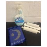 New bottle of shower cleaner, shower back