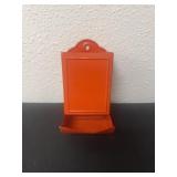 vintage orange metal wall-mounted match holder