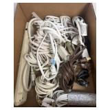 Group of extension cords and surge protector