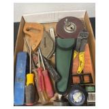 Tape measure, wire cutter, screw driver and more