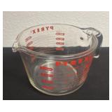 Vintage Pyrex measuring cup has small chip