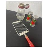 Nut grinder and butter cutter and shakers