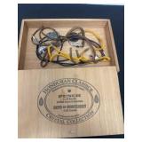 Bolo ties and necklaces with wood cigar box