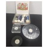 Cigar box of candles and candle holders