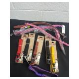 Group of leashes and collars new.