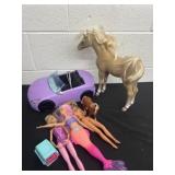 Barbies with barbie car and horses