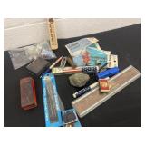 Needles, train horn, safety pins, key holder and