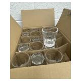 Box of cutty shark shot glasses.