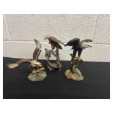 3 bald eagle figurines