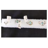 Group of four silver plated non tarnish very size