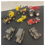 Group of Tonka trucks and pencil sharpeners