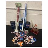 Group of new college team items necklaces desk