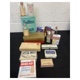 Group of vintage medical containers, boxes and