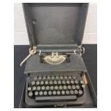 Vintage type writer corona with case