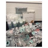 Diapers, bottle my babies first years and  cart