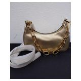 New gold colored Michael Kors purse.
