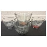 4 glass bowls: broncos, long horns Georgia ans