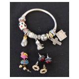 Brighton jewelry charm bracelet, three pairs of