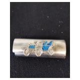 Vintage collectible lighter case.  Embossed