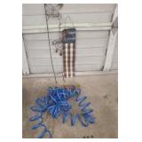 Water hose and yard art