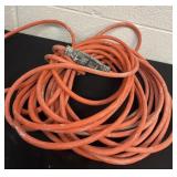 Orange extension cord.