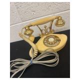 vintage cream and gold French-style rotary phone