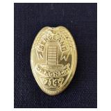 Vintage replica collectible pin of the badge worn