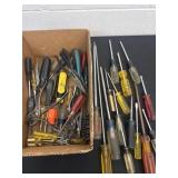 Group of screw drivers and needle point pliers