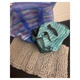 Beach bags and gray bathroom rug.