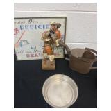 Water can picture frame and paper man