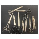 Group of scissors ans nut tools.  Some are vintage