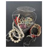 Heart trinket box with jewelry.
