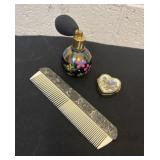 Vintage comb, perfume bottle and pill container