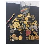 Jar full of military pins and buttons